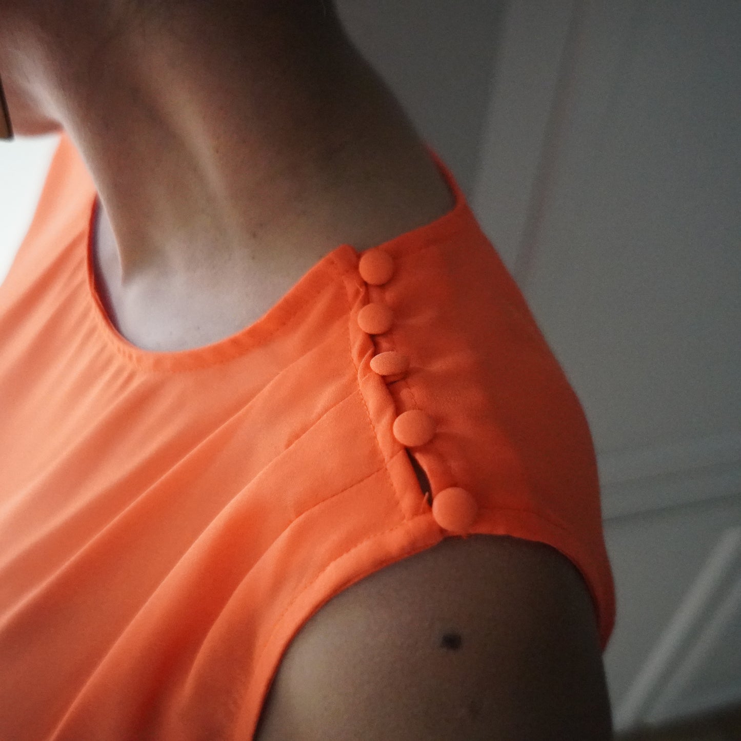 Orange Sleeveless Button Detail Top